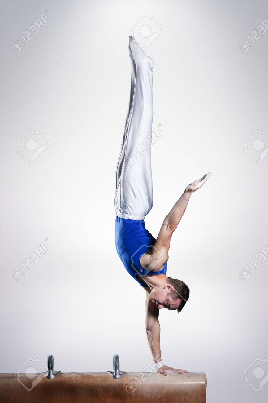 portrait of young man gymnasts competing in the stadium - 81110801 portrait of young man gymnasts competing in the stadium - 81110801