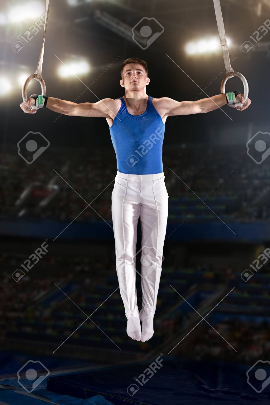 portrait of young man gymnasts competing in the stadium - 80731001 portrait of young man gymnasts competing in the stadium - 80731001
