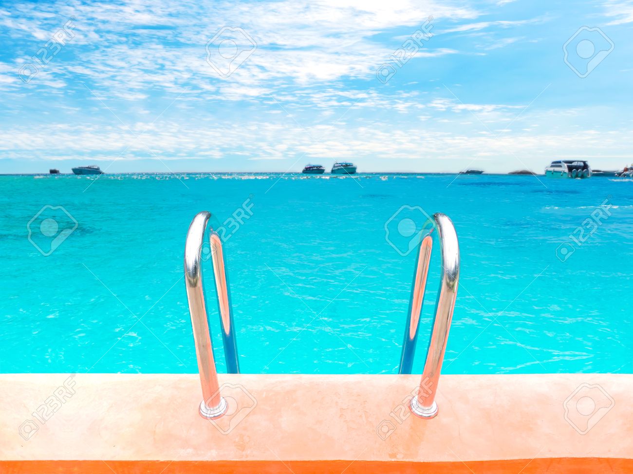 Swimming Pool Background close up swimming pool stair over blur turquoise sea and blue Swimming Pool Background close up swimming pool stair over blur turquoise sea and blue
