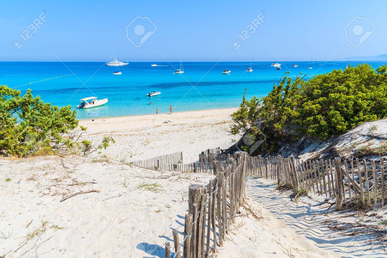 Path To Saleccia Beach With White Sand And Azure Sea Water Near