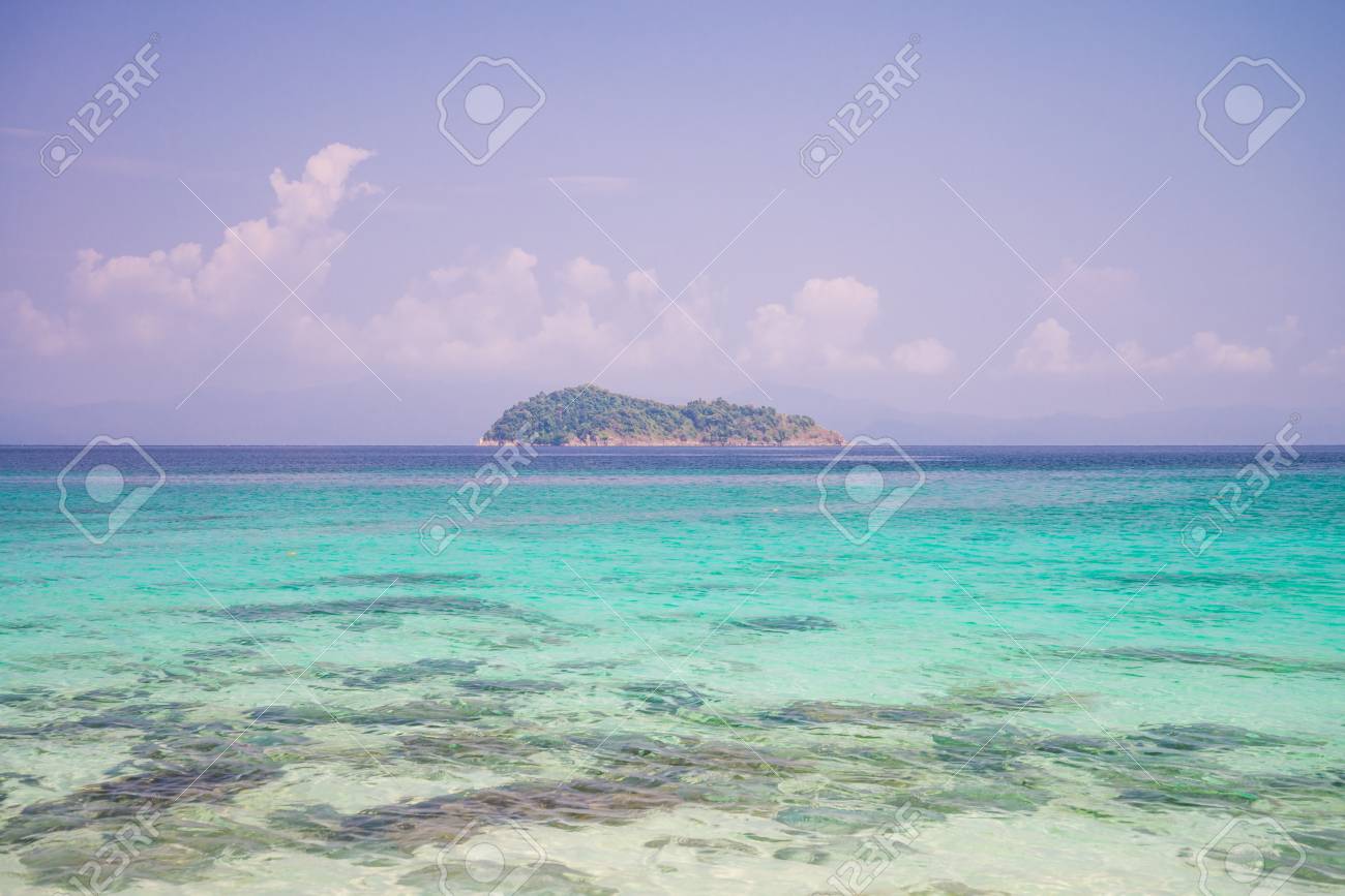 Crystal Clear Water Of Tropical Island Beach In Sunny Day Summer
