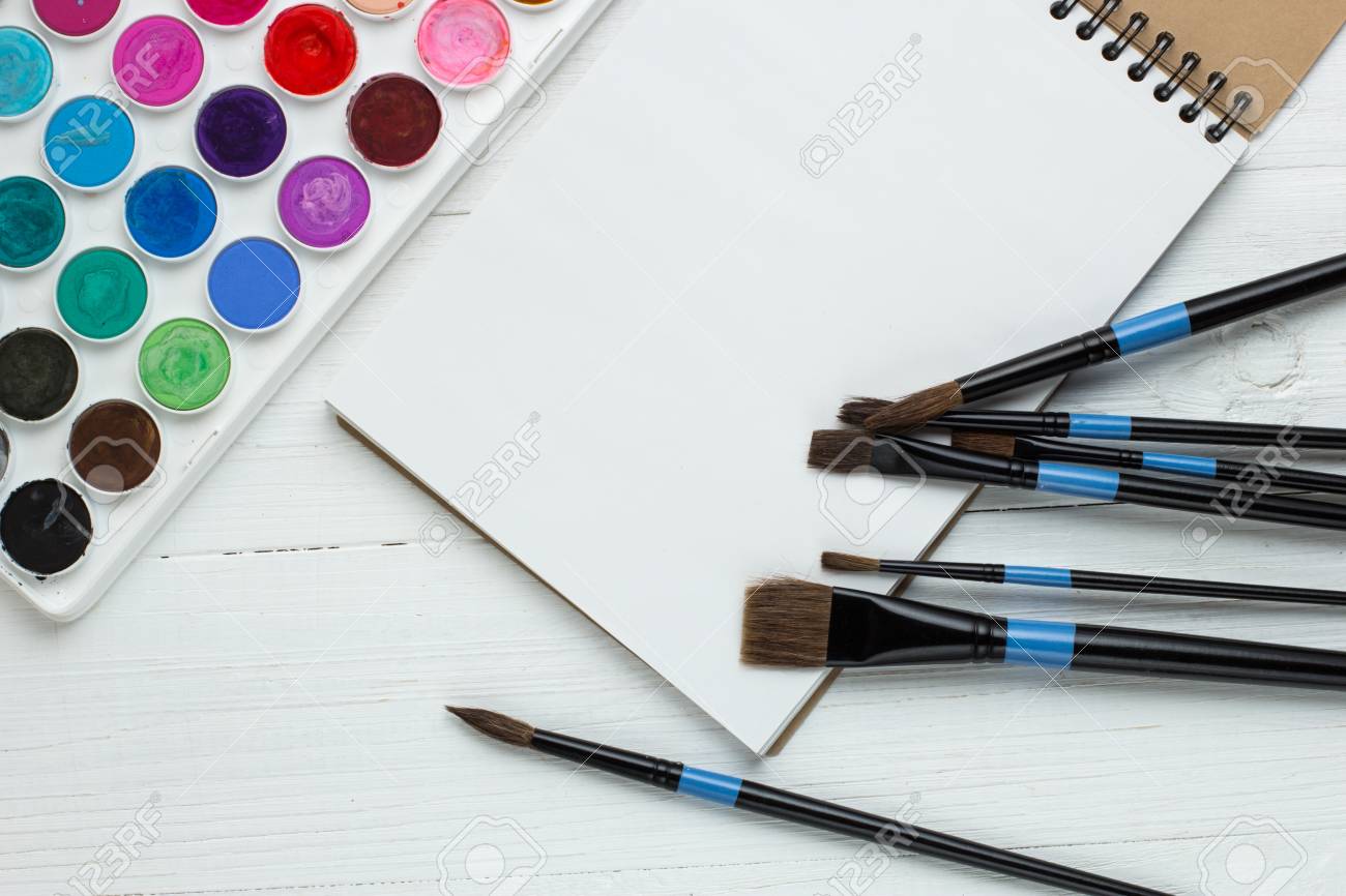 Paint Brushes And Empty Sketchbook Stock Photo, Picture and Royalty Free  Image. Image 98863205.