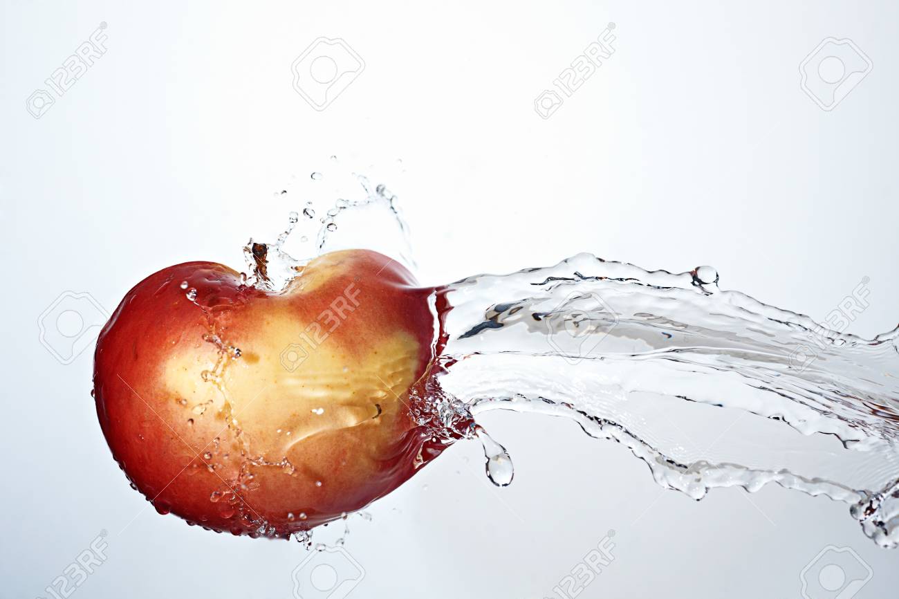 fresh red apple underwater