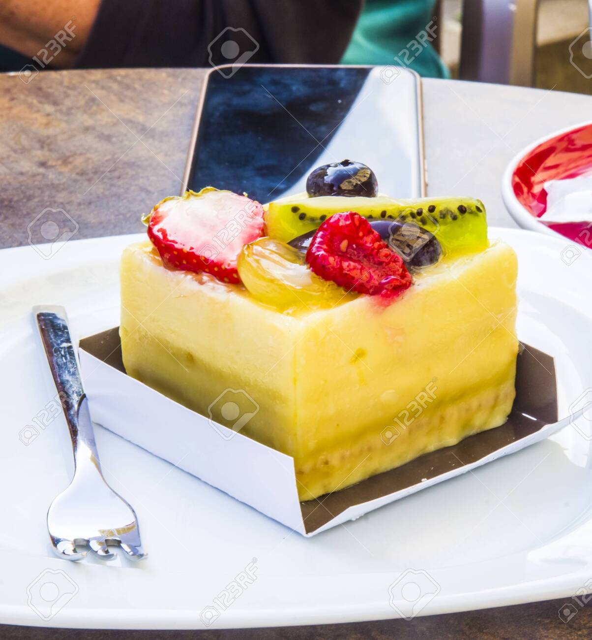 cake, passion fruit semifreddo cube with strawberry, kiwi, grapes, plum, blackberry and cape gooseberries - 147457333 cake, passion fruit semifreddo cube with strawberry, kiwi, grapes, plum, blackberry and cape gooseberries - 147457333