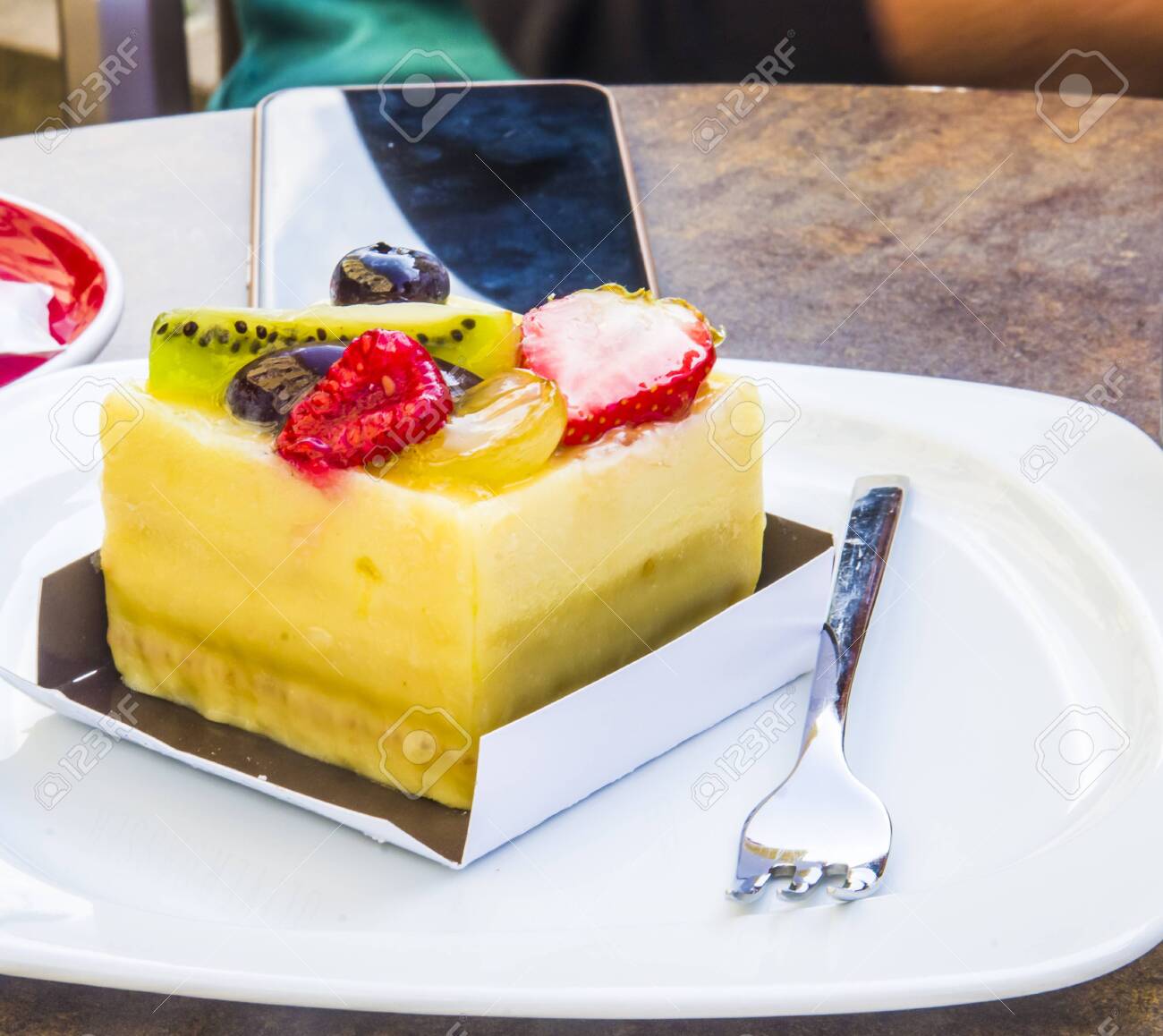 cake, passion fruit semifreddo cube with strawberry, kiwi, grapes, plum, blackberry and cape gooseberries - 147457335 cake, passion fruit semifreddo cube with strawberry, kiwi, grapes, plum, blackberry and cape gooseberries - 147457335