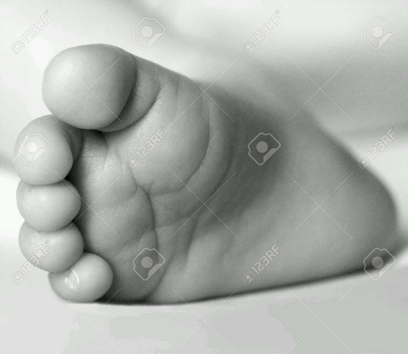 Un Coup De Pied De Bebe En Noir Et Blanc Banque D Images Et Photos Libres De Droits Image Un Coup De Pied De Bebe En Noir Et Blanc Banque D Images Et Photos Libres De Droits Image
