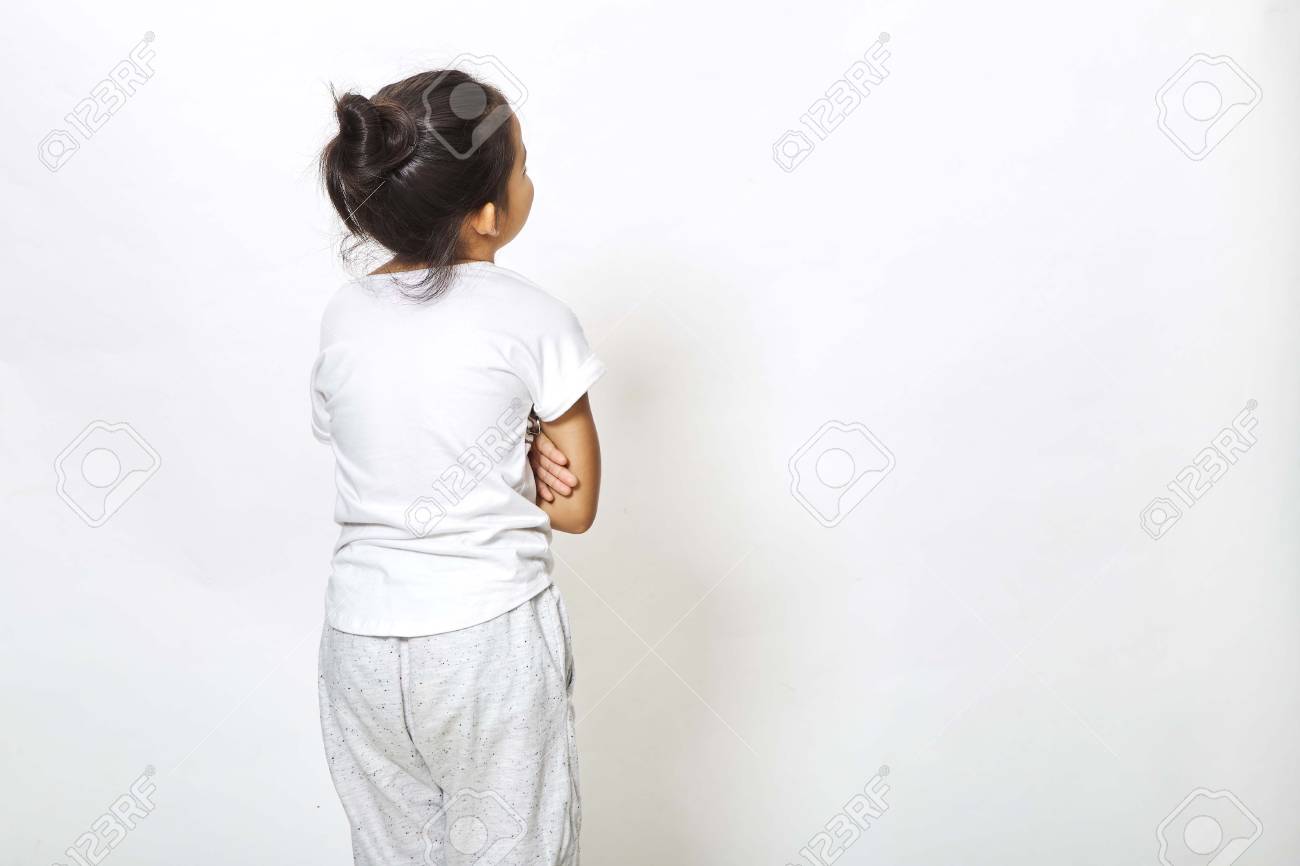 Back view of little girl looking at wall. Rear view on white background, Back to school concept - 100588703 Back view of little girl looking at wall. Rear view on white background, Back to school concept - 100588703
