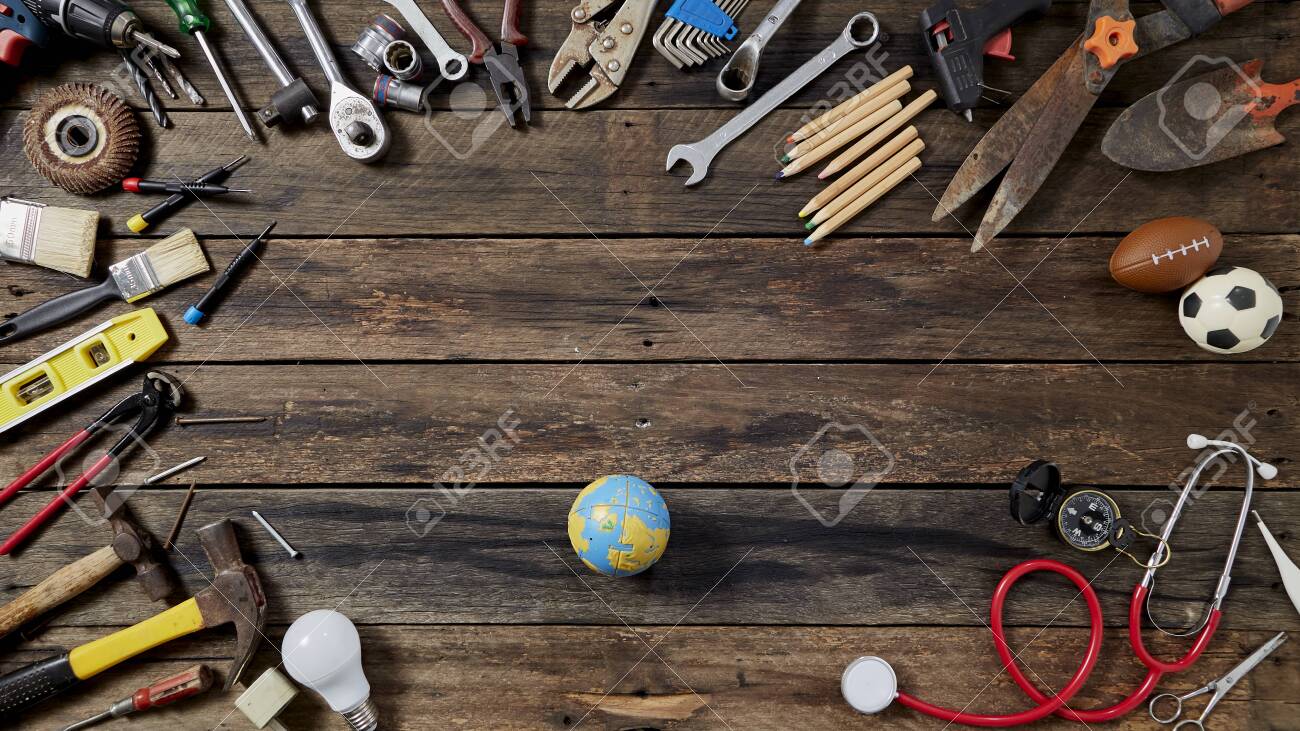 Empty chalkboard with many handy tools, on wooden background top view with copy space for text, Labor day background - 121265783 Empty chalkboard with many handy tools, on wooden background top view with copy space for text, Labor day background - 121265783