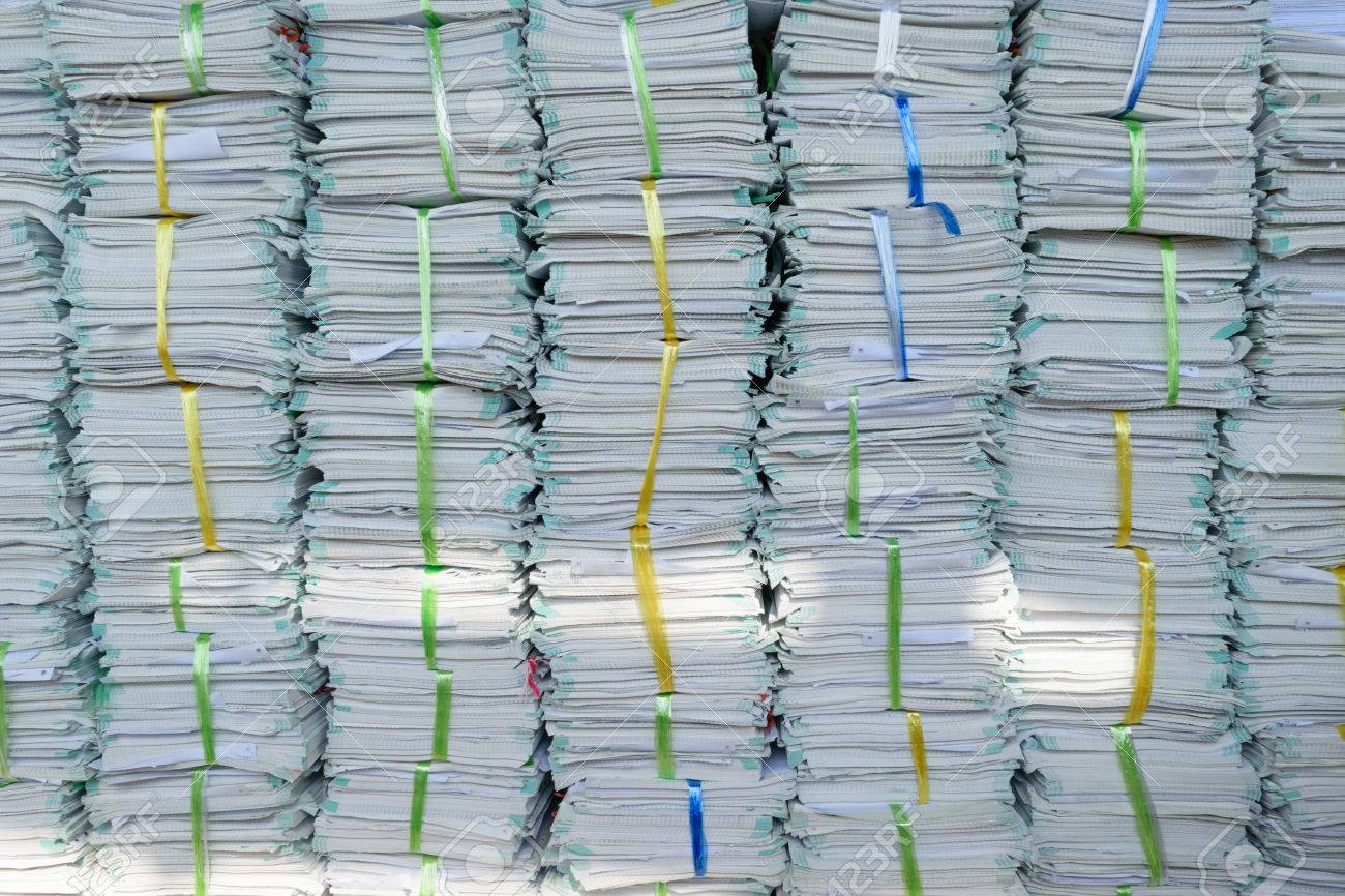 5. Old files. Daily news background. Stack documents isolated. Old file.