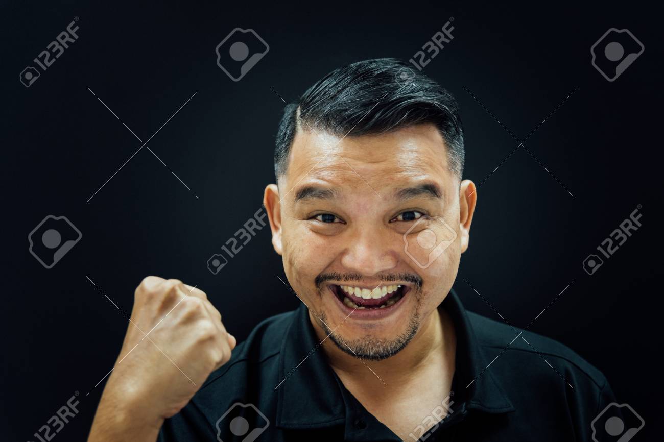 Asian Man 40s Have A Short Hair With A Beard In Black Polo Shirt