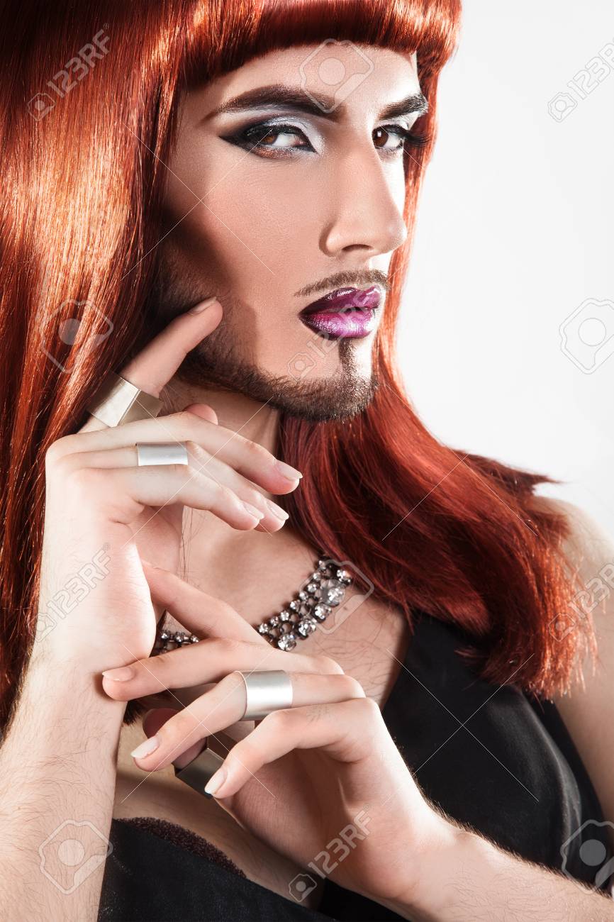 Closeup Portrait Of Cute Redhair Bearded Shemale Model With Nice Makeup Studio Shot Vertical Closeup Portrait Of Cute Redhair Bearded Shemale Model With Nice Makeup Studio Shot Vertical
