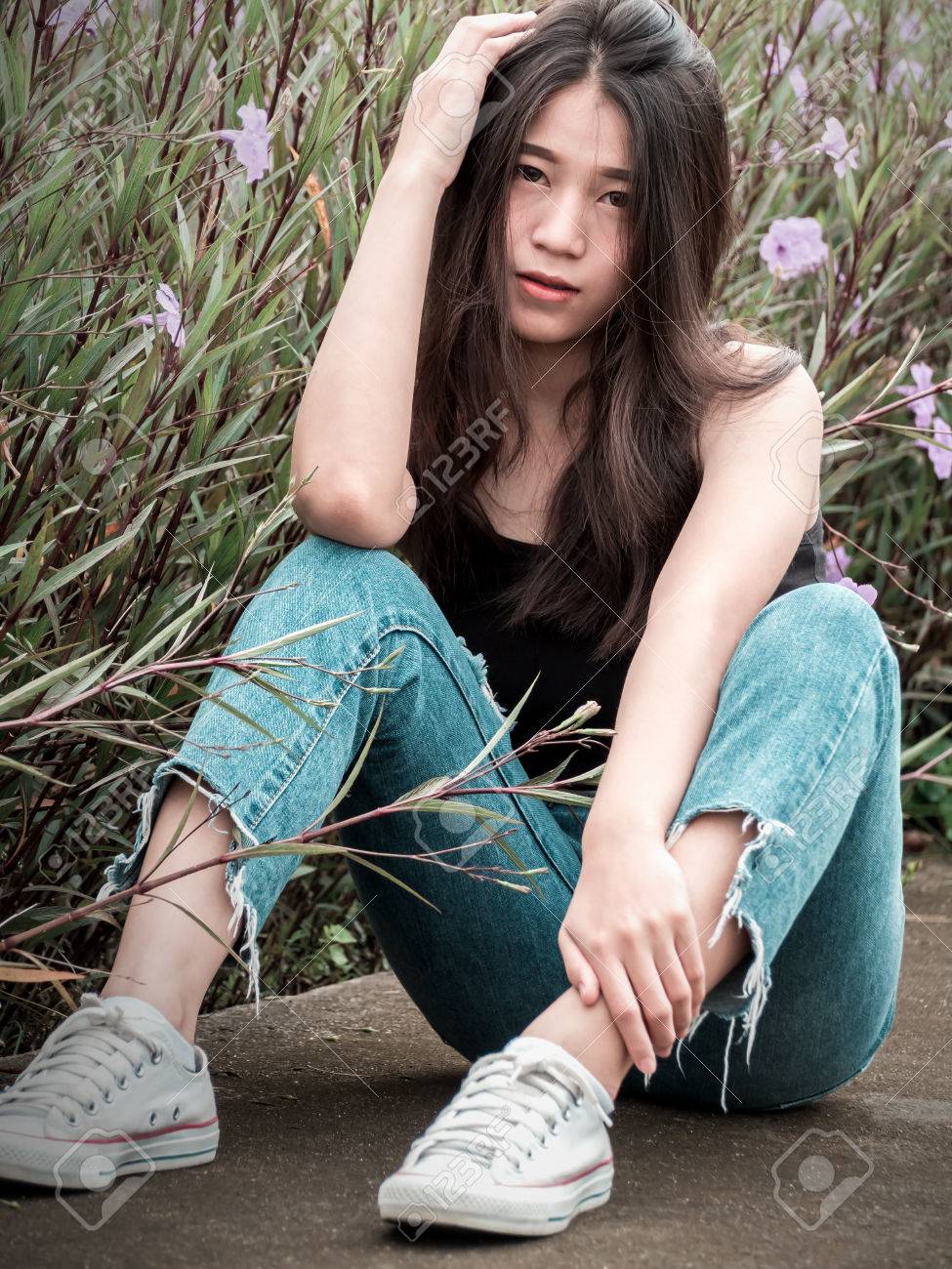Portrait Image Of Sexy Teenager Girl In Flower Garden Fashion Sexy Woman In Tank Portrait Image Of Sexy Teenager Girl In Flower Garden Fashion Sexy Woman In Tank
