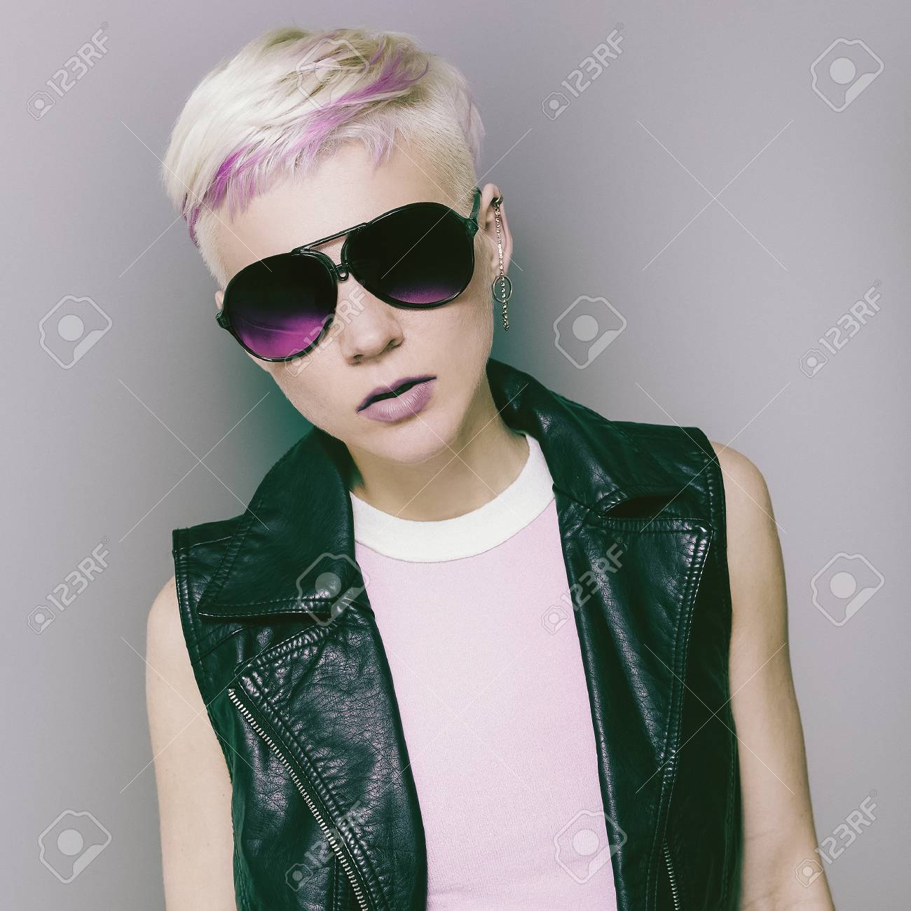 Blonde With Short Hair And Trendy Sunglasses Rock Style Stock