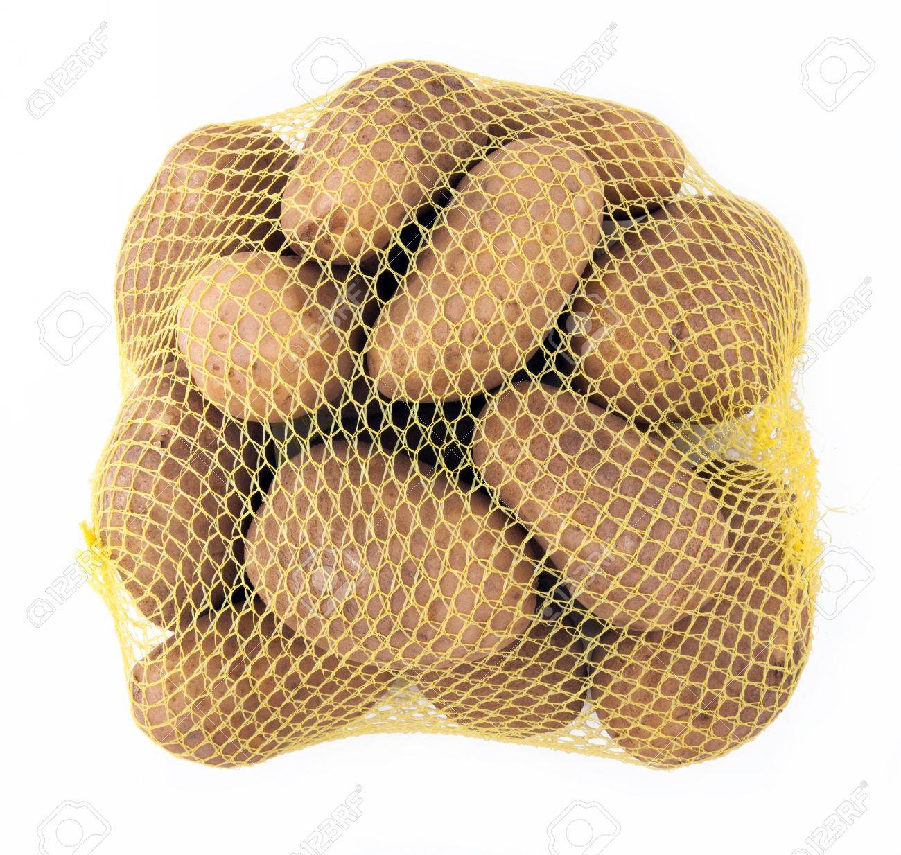A Yellow Mesh Bag Of Russet Potatoes Stock Photo A Yellow Mesh Bag Of Russet Potatoes Stock Photo