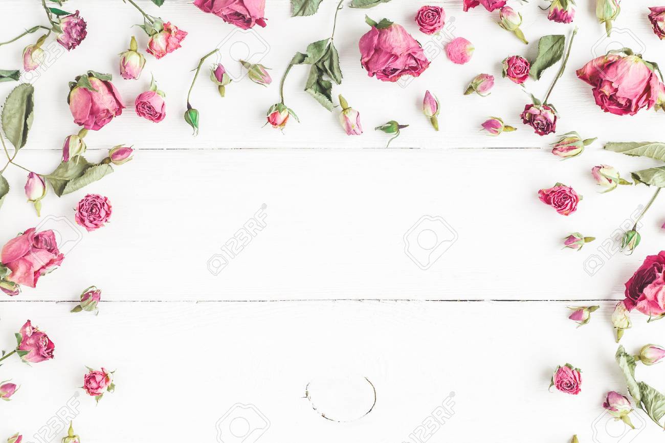 Flowers Composition Frame Made Of Dried Rose Flowers On White Wooden Background Flat Lay Top View Stock Photo Picture And Royalty Free Image Image