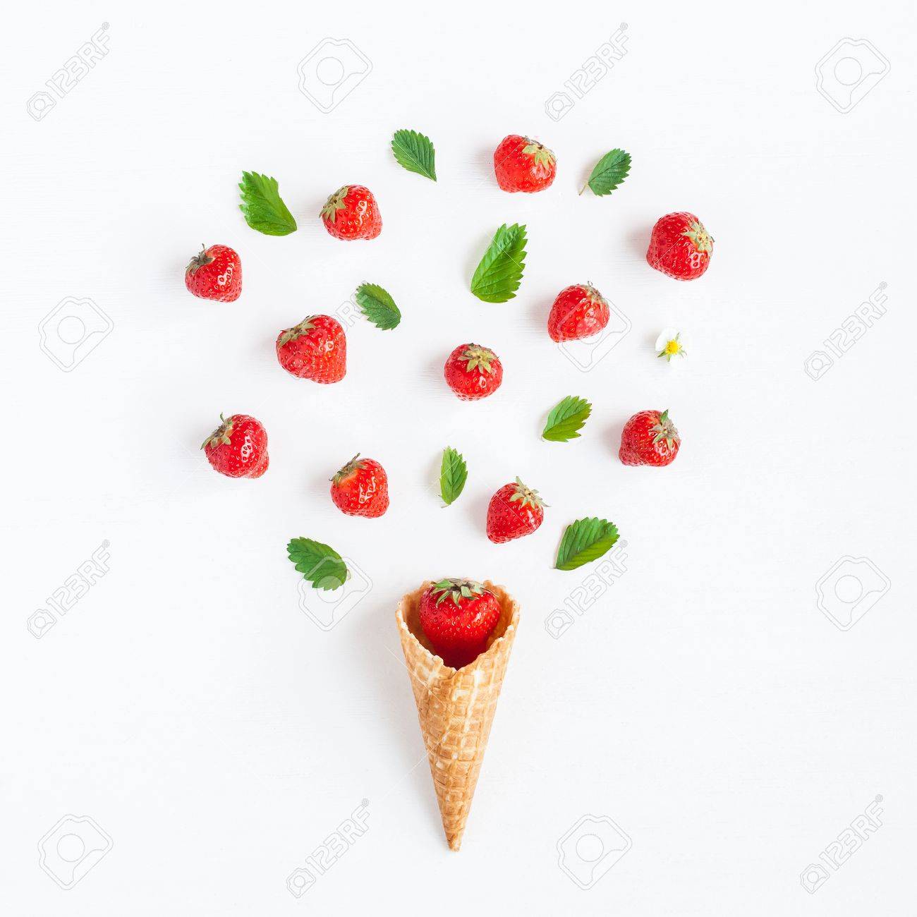 Strawberry in waffle cone. Creative strawberry on white background. Flat lay, top view - 81914213 Strawberry in waffle cone. Creative strawberry on white background. Flat lay, top view - 81914213