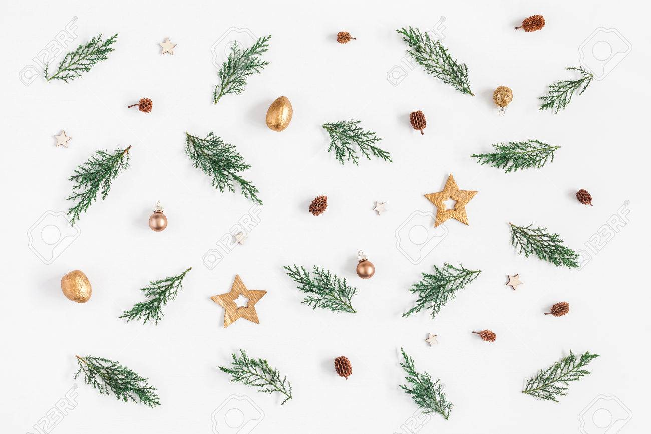 Christmas composition. Pattern made of pine branches and christmas decorations on white background. Flat lay, top view - 87491084 Christmas composition. Pattern made of pine branches and christmas decorations on white background. Flat lay, top view - 87491084