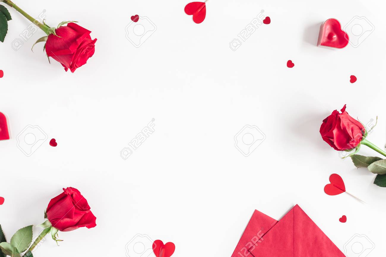 Valentine's Day. Frame made of rose flowers, gifts, candles, confetti on white background. Valentines day background. Flat lay, top view, copy space - 93136373 Valentine's Day. Frame made of rose flowers, gifts, candles, confetti on white background. Valentines day background. Flat lay, top view, copy space - 93136373