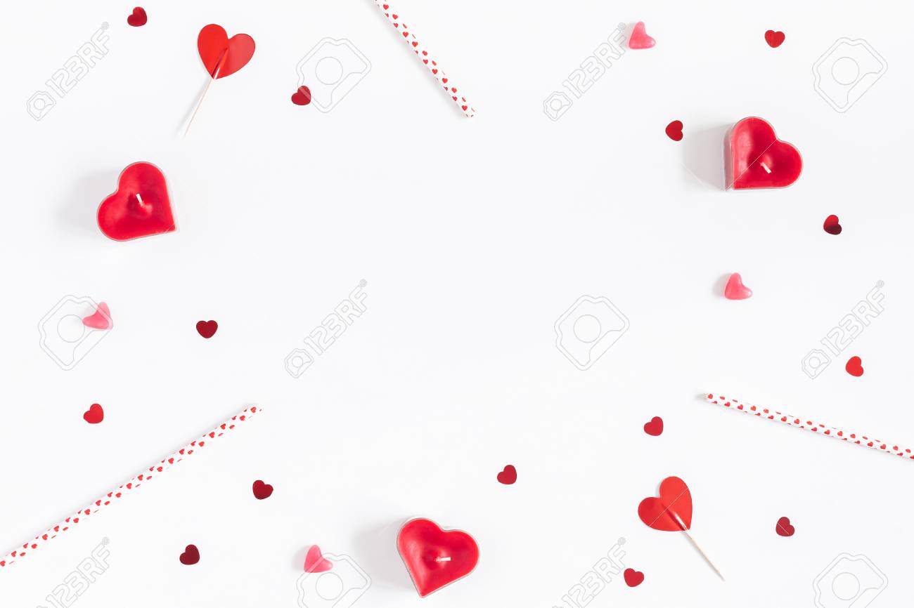 Valentine's Day. Frame made of candles, confetti on white background. Valentines day background. Flat lay, top view, copy space - 93854918 Valentine's Day. Frame made of candles, confetti on white background. Valentines day background. Flat lay, top view, copy space - 93854918
