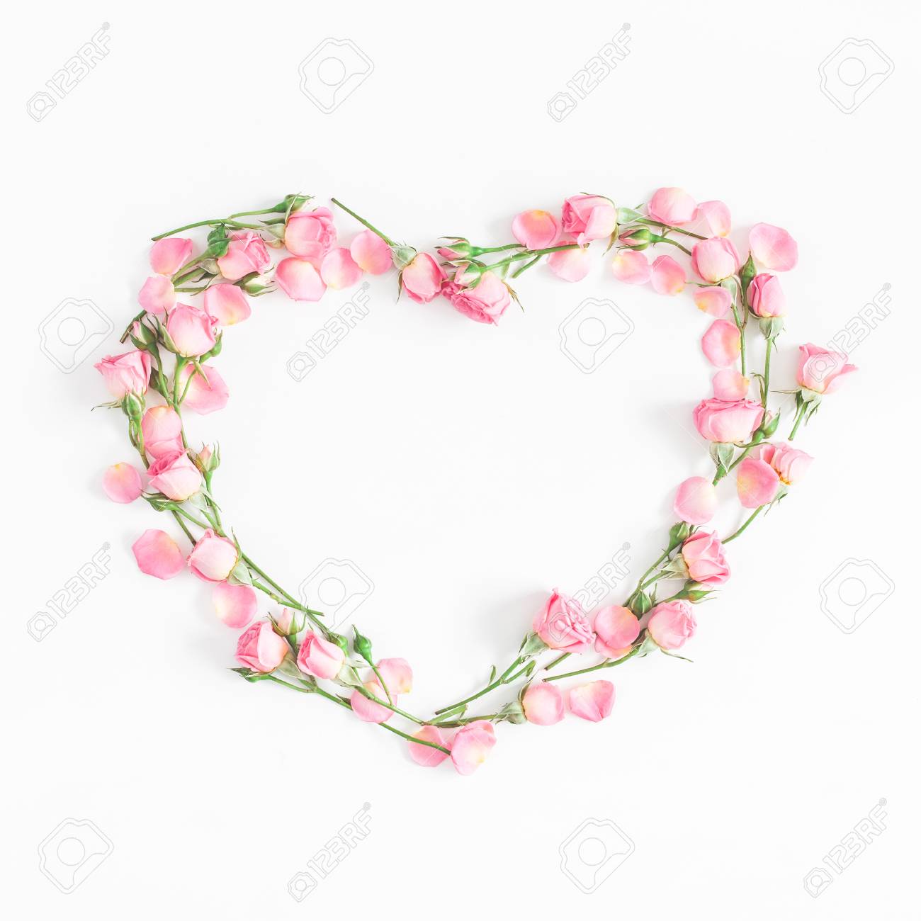 Flowers composition. Heart symbol made of pink rose flowers on white background. Flat lay, top view, copy space, square - 94033564 Flowers composition. Heart symbol made of pink rose flowers on white background. Flat lay, top view, copy space, square - 94033564