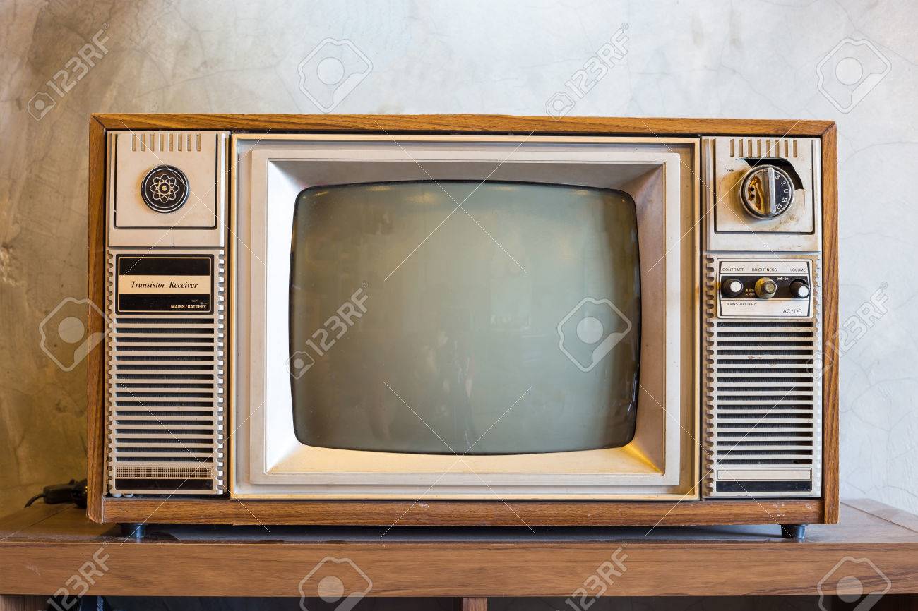 retro tv with wooden case in room with vintage wallpaper on wood table - 42038026 retro tv with wooden case in room with vintage wallpaper on wood table - 42038026