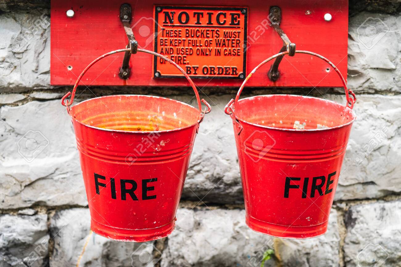 A Fire Buckets Is A Buckets Filled With Water Or Sand Which Is Used To Prevent Or Extinguish Fires Stock Photo, Picture And Royalty Free Image. Image 134226650.