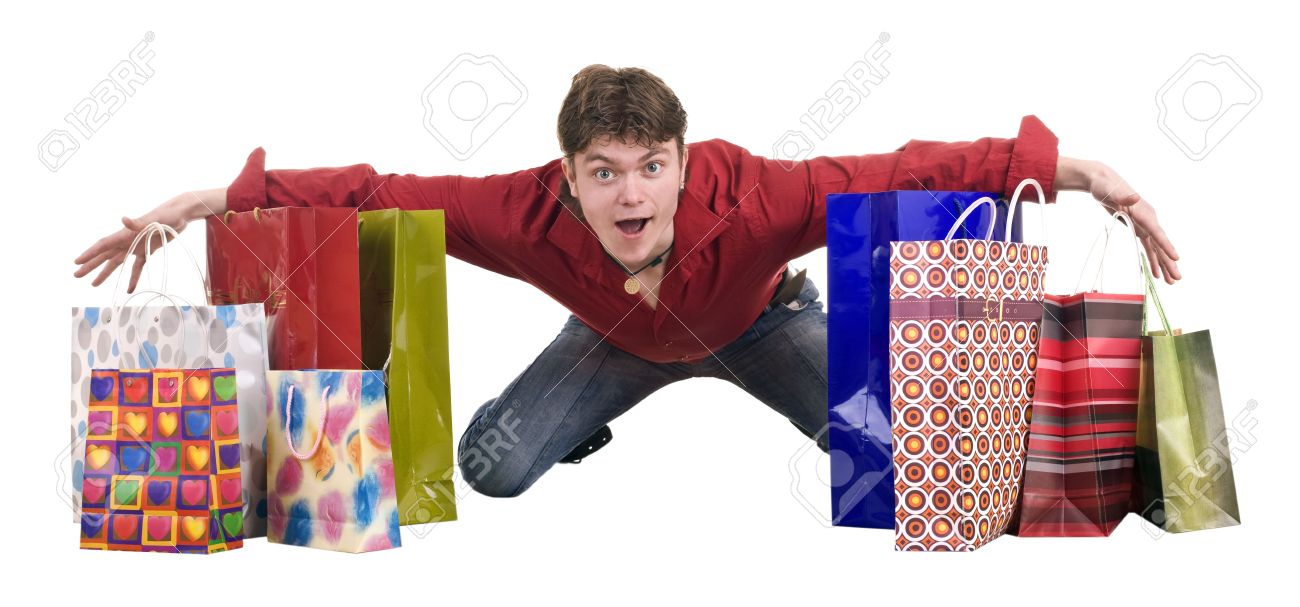 Cheerful funny happy shopping man. Isolated. - 5695264 Cheerful funny happy shopping man. Isolated. - 5695264