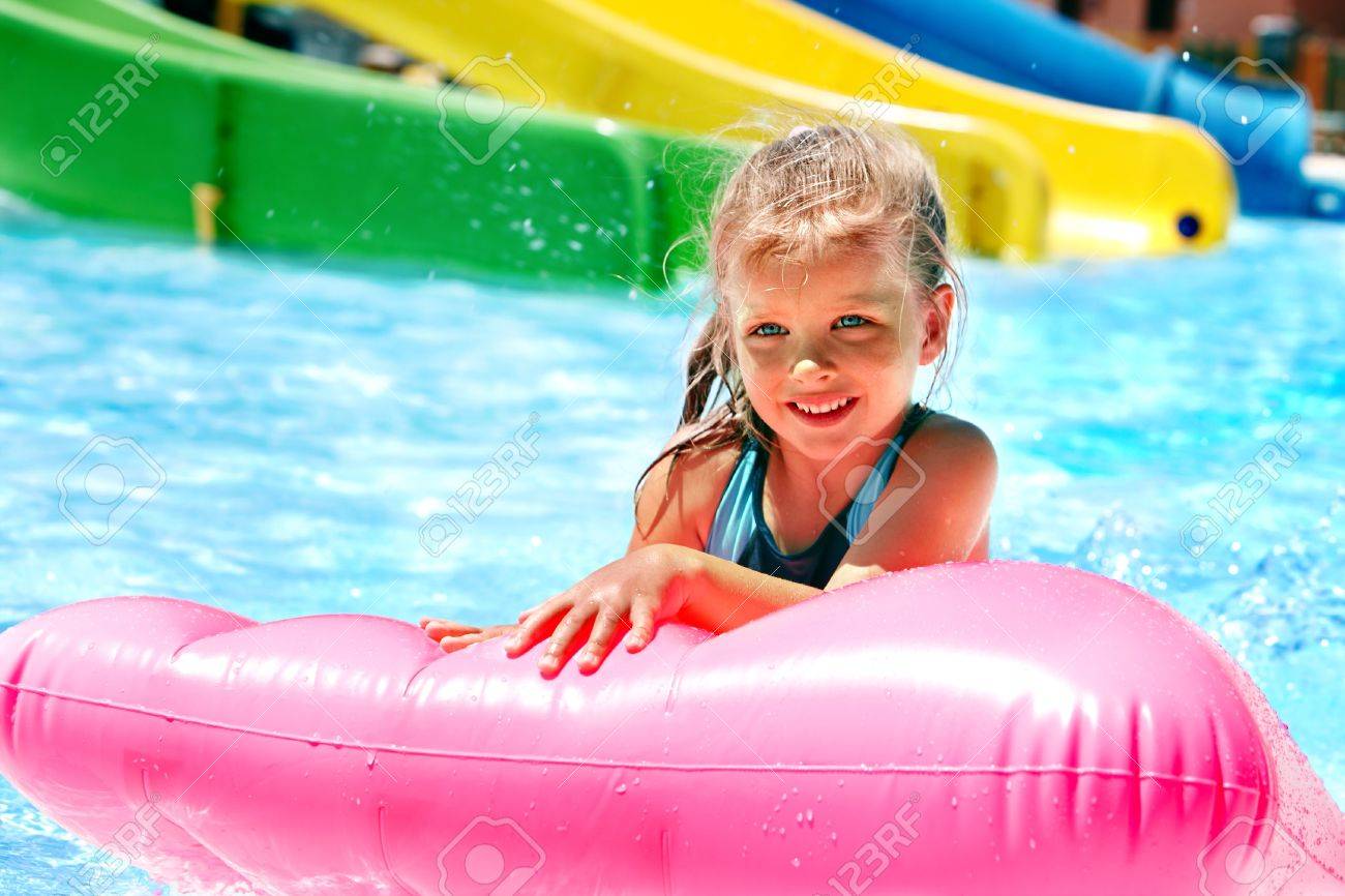 Child On Water Slide At Aquapark Summer Holiday Stock Photo Picture And Royalty Free Image Image
