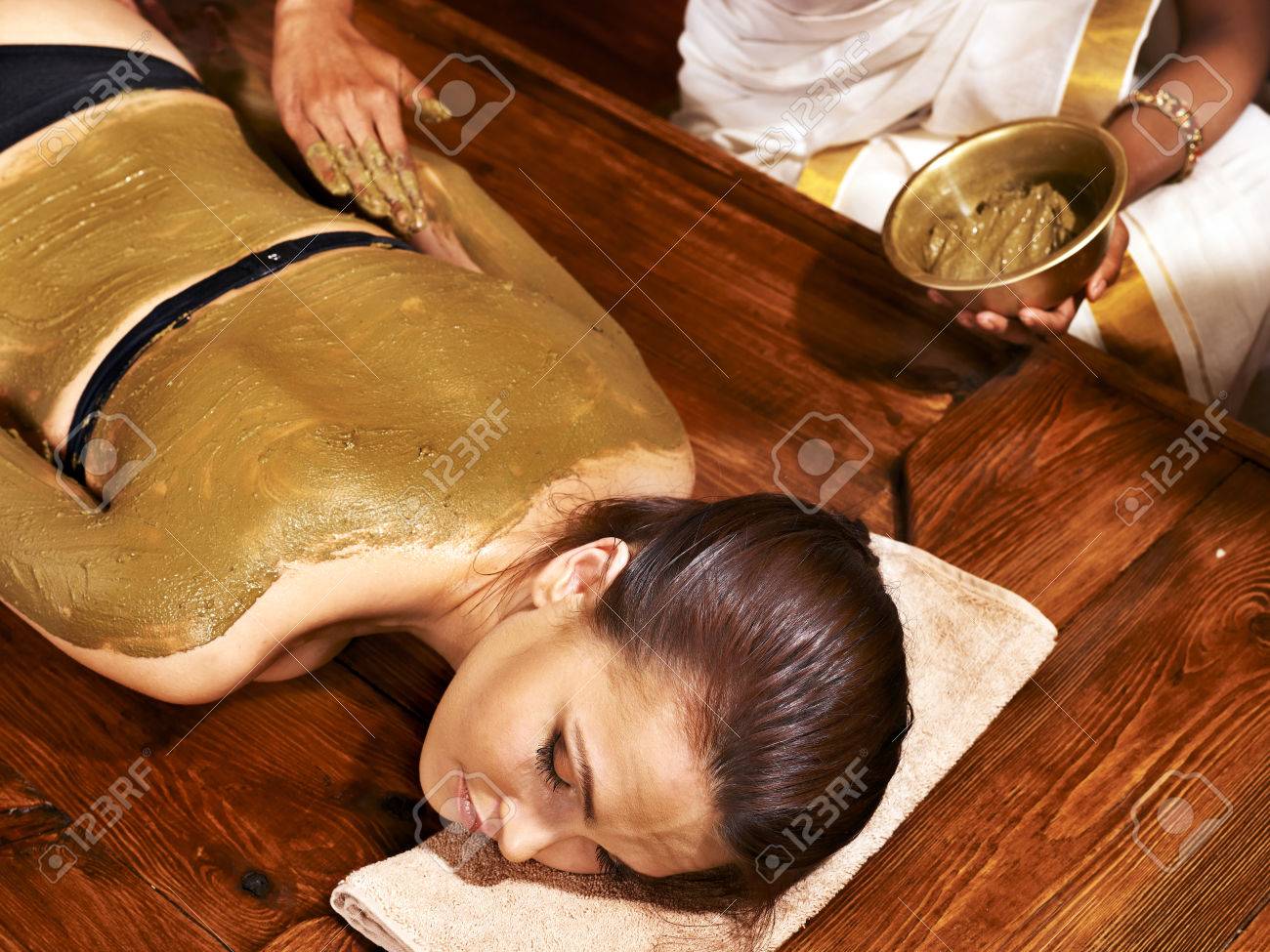 Young woman having body Ayurveda spa massage. - 22673325 Young woman having body Ayurveda spa massage. - 22673325