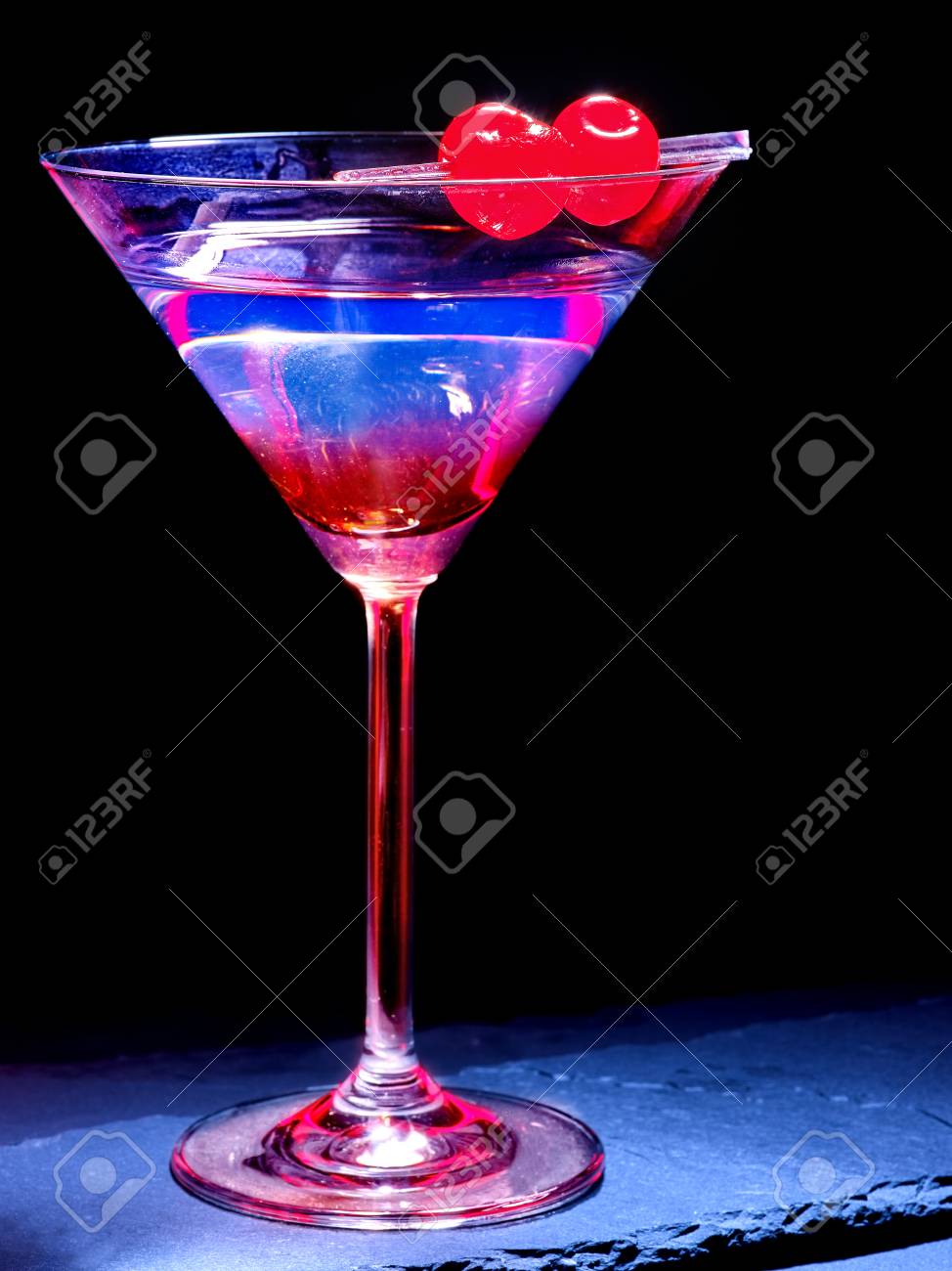 transparent cherry cocktail on black background cocktail card