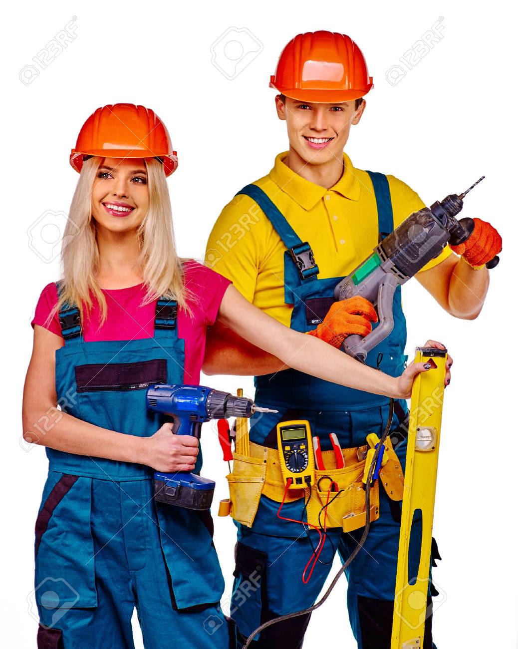 Feliz Mujer Rubia Y Herramientas De Construcción Que Sostiene El Hombre Apuesto Aislado. Fotos, Retratos, Imágenes Y Fotografía Archivo Libres De Derecho. Image 51120473.