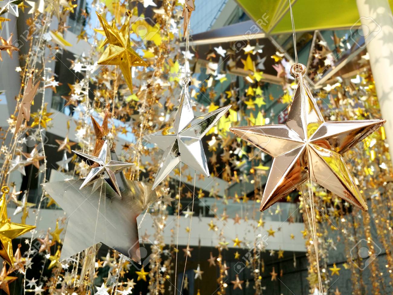 gold silver bronze stars decoration for merry christmas and happy new years stock photo - Decorating With Silver And Gold For Christmas gold silver bronze stars decoration for merry christmas and happy new years stock photo - Decorating With Silver And Gold For Christmas