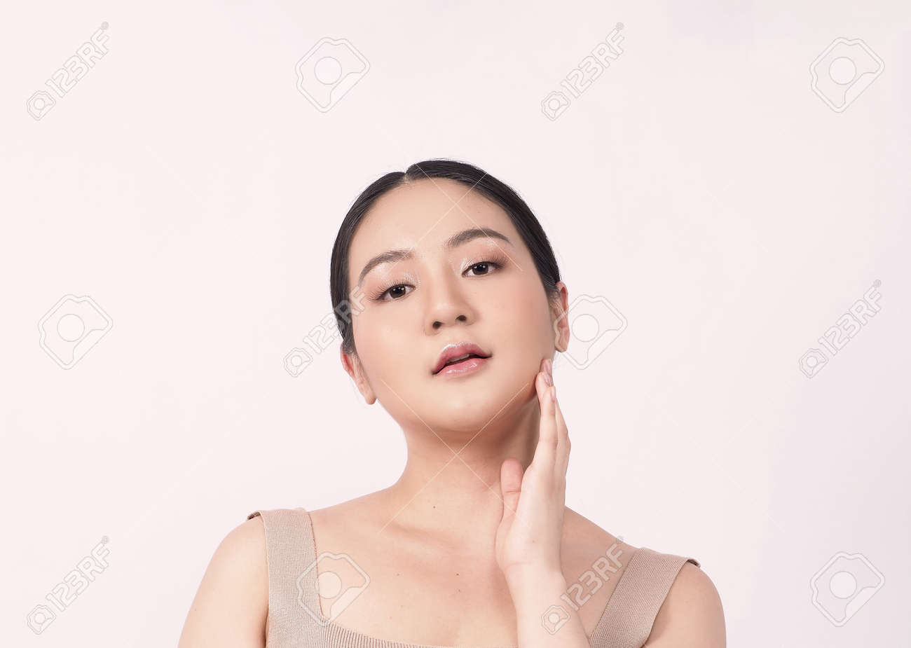 Beauty skin. makeup concept. Young pretty woman black hair and beauty face make up for skincare cosmetic. Showing delicate soft and firm and ageless facial skin. Oil type skin. Close up facial. beauty shot. - 168771741 Beauty skin. makeup concept. Young pretty woman black hair and beauty face make up for skincare cosmetic. Showing delicate soft and firm and ageless facial skin. Oil type skin. Close up facial. beauty shot. - 168771741