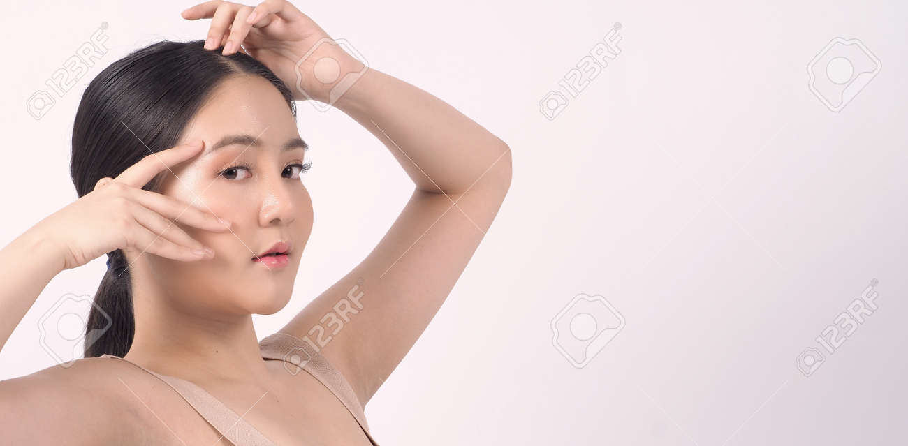 Beauty skin. makeup concept. Young pretty woman black hair and beauty face make up for skincare cosmetic. Showing delicate soft and firm and ageless facial skin. Oil type skin. Close up facial. beauty shot. - 168771751 Beauty skin. makeup concept. Young pretty woman black hair and beauty face make up for skincare cosmetic. Showing delicate soft and firm and ageless facial skin. Oil type skin. Close up facial. beauty shot. - 168771751