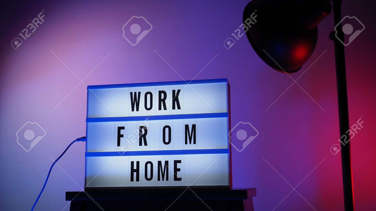 Work from home light box in studio. WFH Text on lightbox. Represent work from home for social distancing concept during coronavirus pandemic. WFH message on light board COVID 19 quarantine situation. - 168300479 Work from home light box in studio. WFH Text on lightbox. Represent work from home for social distancing concept during coronavirus pandemic. WFH message on light board COVID 19 quarantine situation. - 168300479