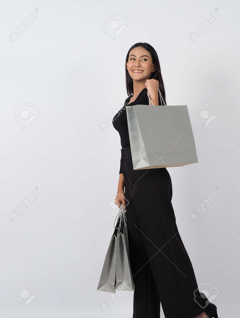 Love Shopping concept. Beautiful Asian woman carrying gray color bags shopping online. isolated on white studio background. online shopping bag. black hair woman love shopping online. Online purchase - 168300577 Love Shopping concept. Beautiful Asian woman carrying gray color bags shopping online. isolated on white studio background. online shopping bag. black hair woman love shopping online. Online purchase - 168300577