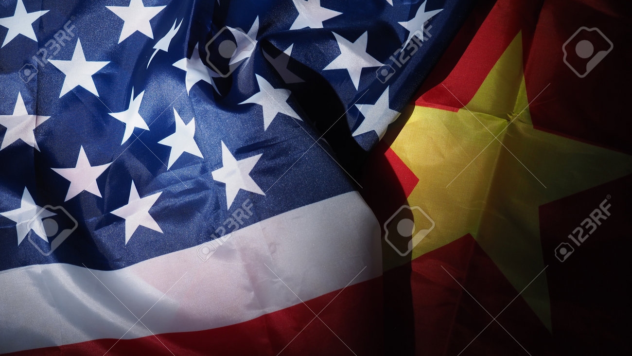 USA and China flag on black background. Represent serious trade tension or trade war between America and China. financial concept. Flags of China and the United States of America on Black. top view angle. - 170314456 USA and China flag on black background. Represent serious trade tension or trade war between America and China. financial concept. Flags of China and the United States of America on Black. top view angle. - 170314456