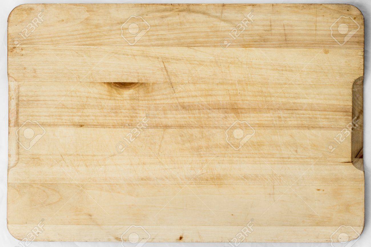 Old and used natural wooden cooking board with cuts - 21071690 Old and used natural wooden cooking board with cuts - 21071690