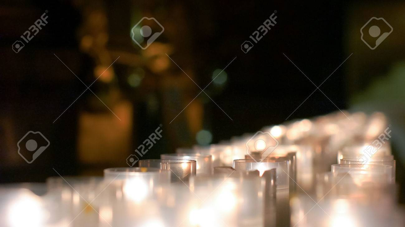 Detailed row of candles grouped together on the christian altar - 60533722 Detailed row of candles grouped together on the christian altar - 60533722
