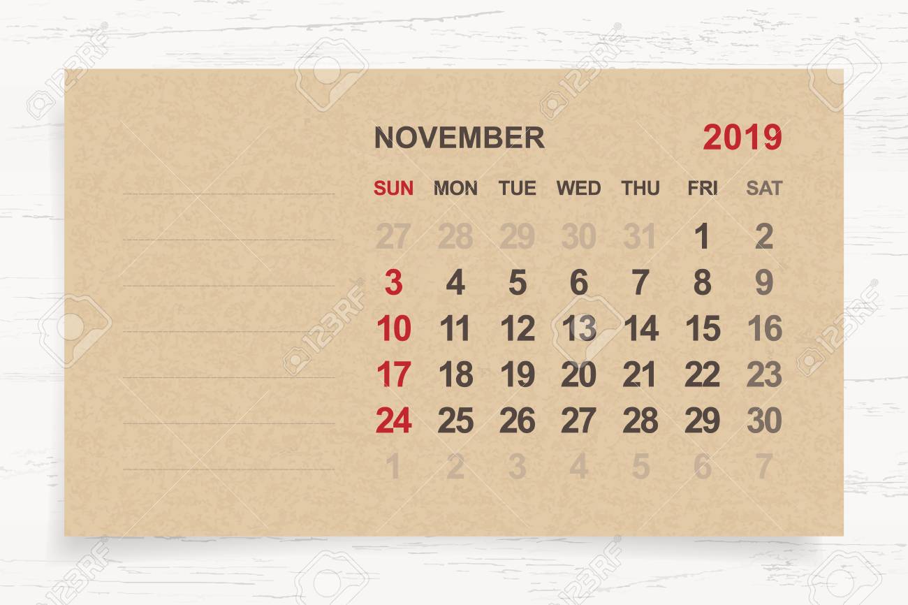 november 2019 monthly calendar on brown paper and wood background monthly calendar november 2019