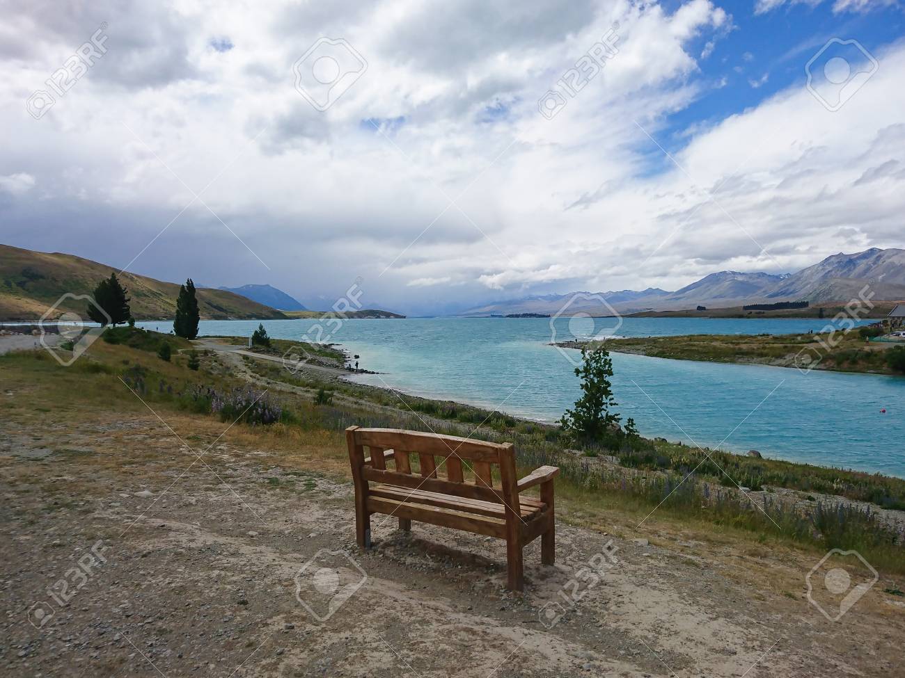 lake tekapo with mountain background natural landscape view stock