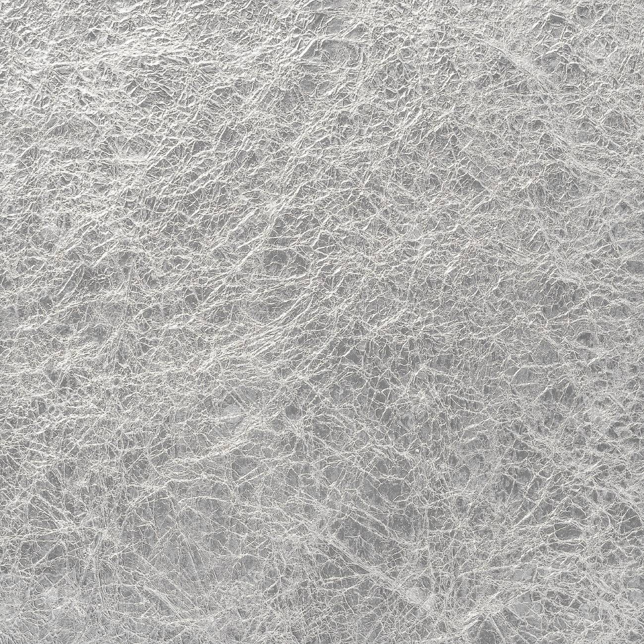 Silver Leaf Foil Background With Shiny Crumpled Uneven Surface For Texture  And Background Stock Photo, Picture and Royalty Free Image. Image 57401218., image size:1299x1300