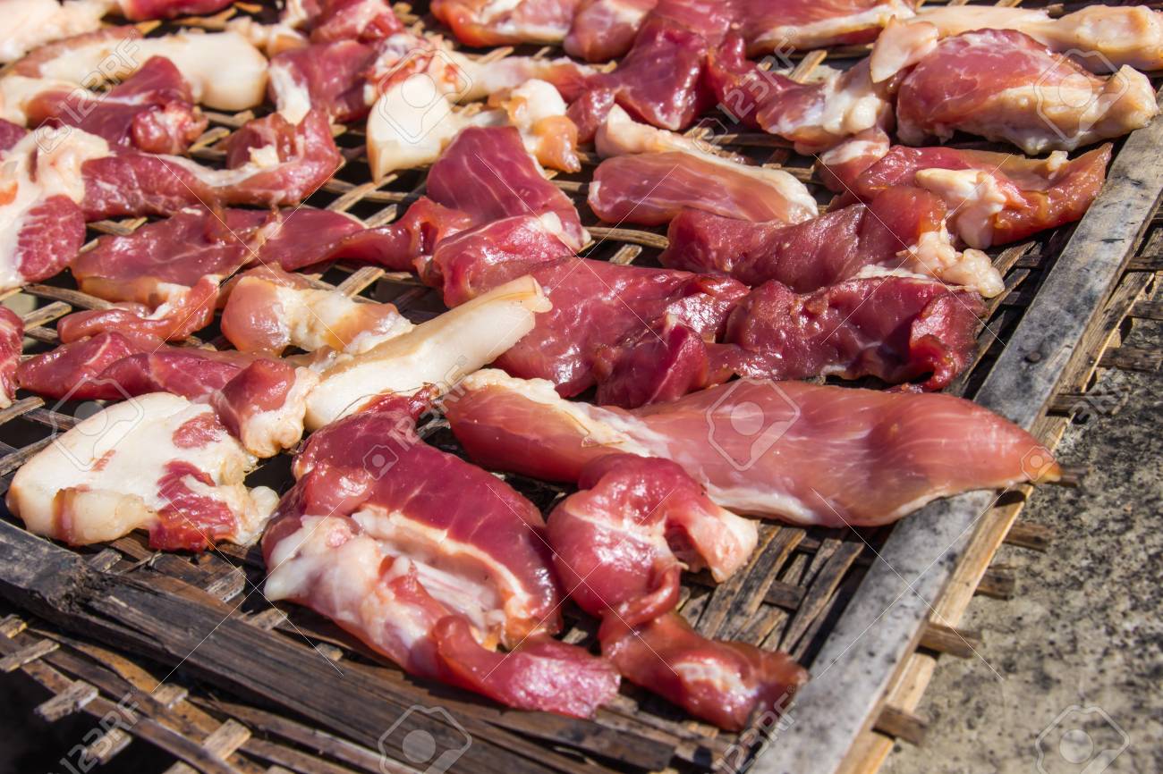 Preserving Pork Meat By Dry With Sun Dried On Bamboo Basket Weave Palat Stock Photo Picture And Royalty Free Image Image 93134195