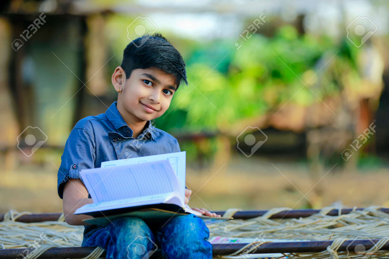 Cute Indian Child Studying At Home Stock Photo, Picture and Royalty Free  Image. Image 182311405., image size:1300x867