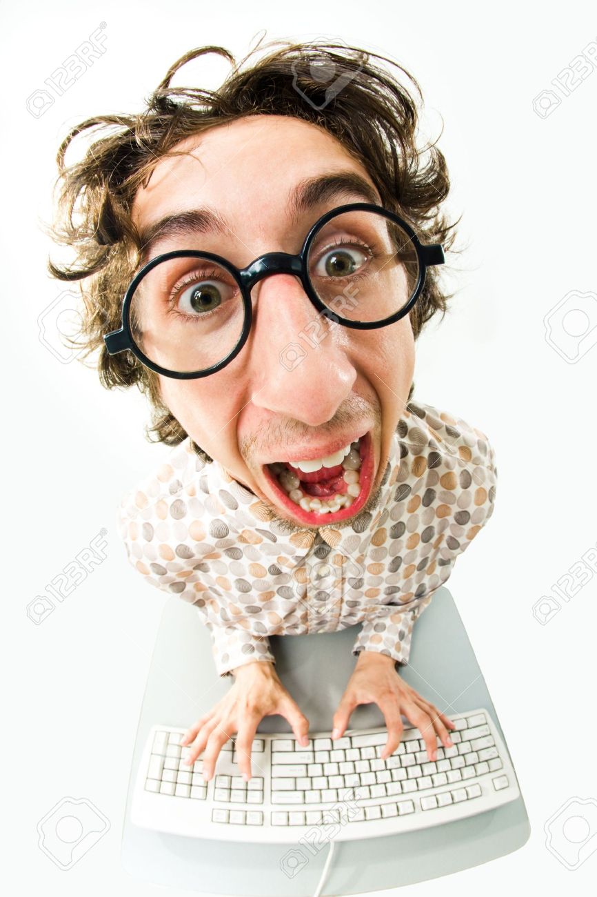 Portrait of funny man screaming during typing a document - 3305501 Portrait of funny man screaming during typing a document - 3305501