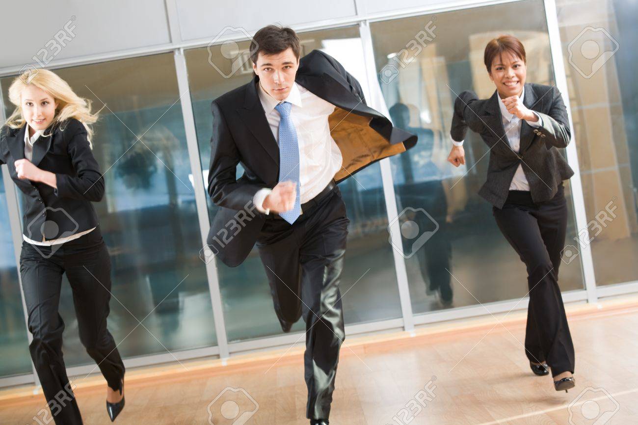 Portrait Of Hurrying People In Suits Running Forwards For Work - 1300x866 - jpeg People Running From Work