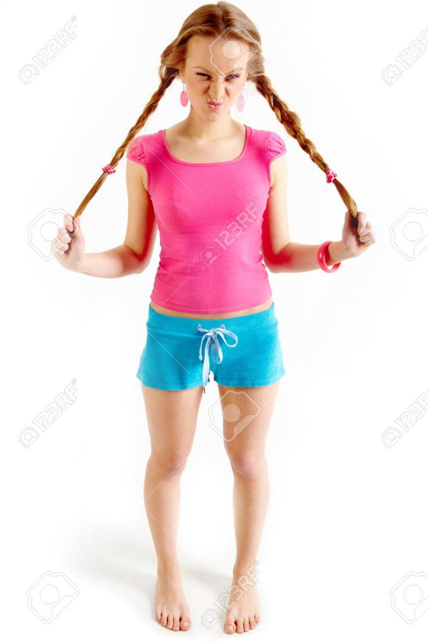 Retrato De Un Adolescente Sulky En Ropa Deportiva Mirando La Cámara Fondo Blanco Fotos, Retratos, Y Fotografía De Archivo Libres Derecho. Image 6894349.