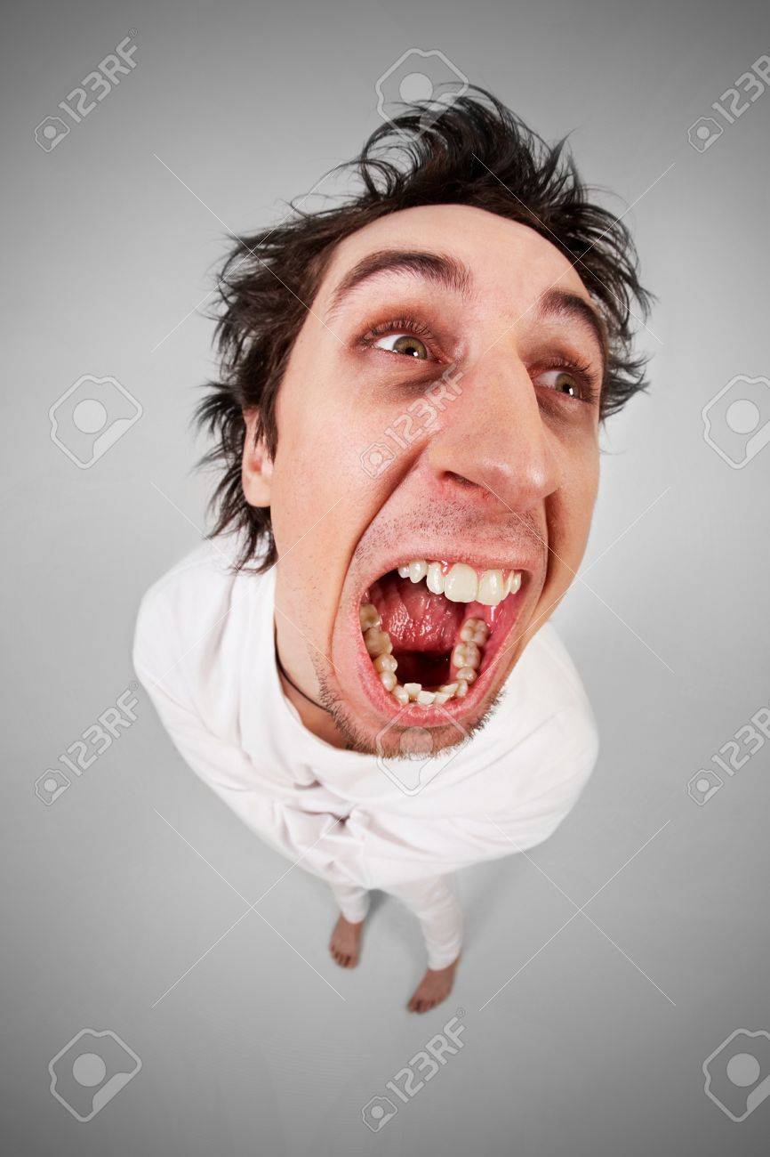 9422590-fish-eye-shot-of-screaming-insane-man-in-strait-jacket-on-grey-background.jpg