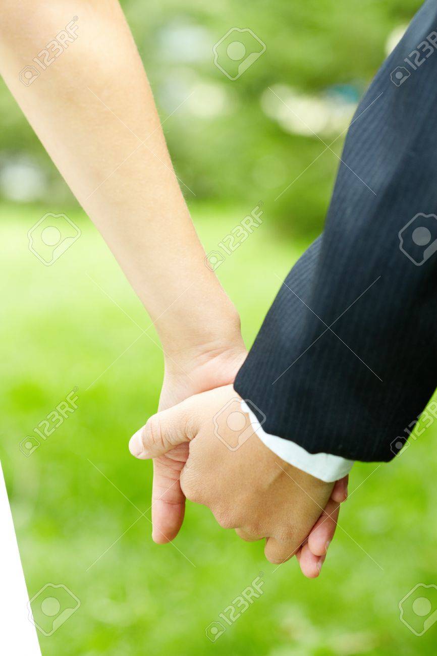 Conceptual Image Of Boy And Girl Hands Together Stock Photo, Picture and  Royalty Free Image. Image 10445987., image size:866x1300