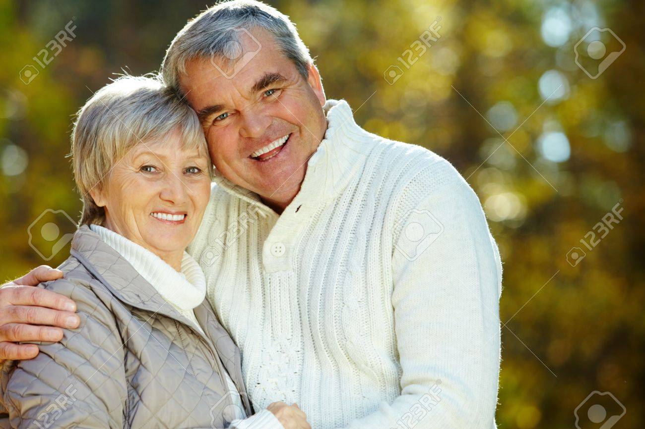 Photo of amorous aged man and woman looking at camera - 10944578 Photo of amorous aged man and woman looking at camera - 10944578